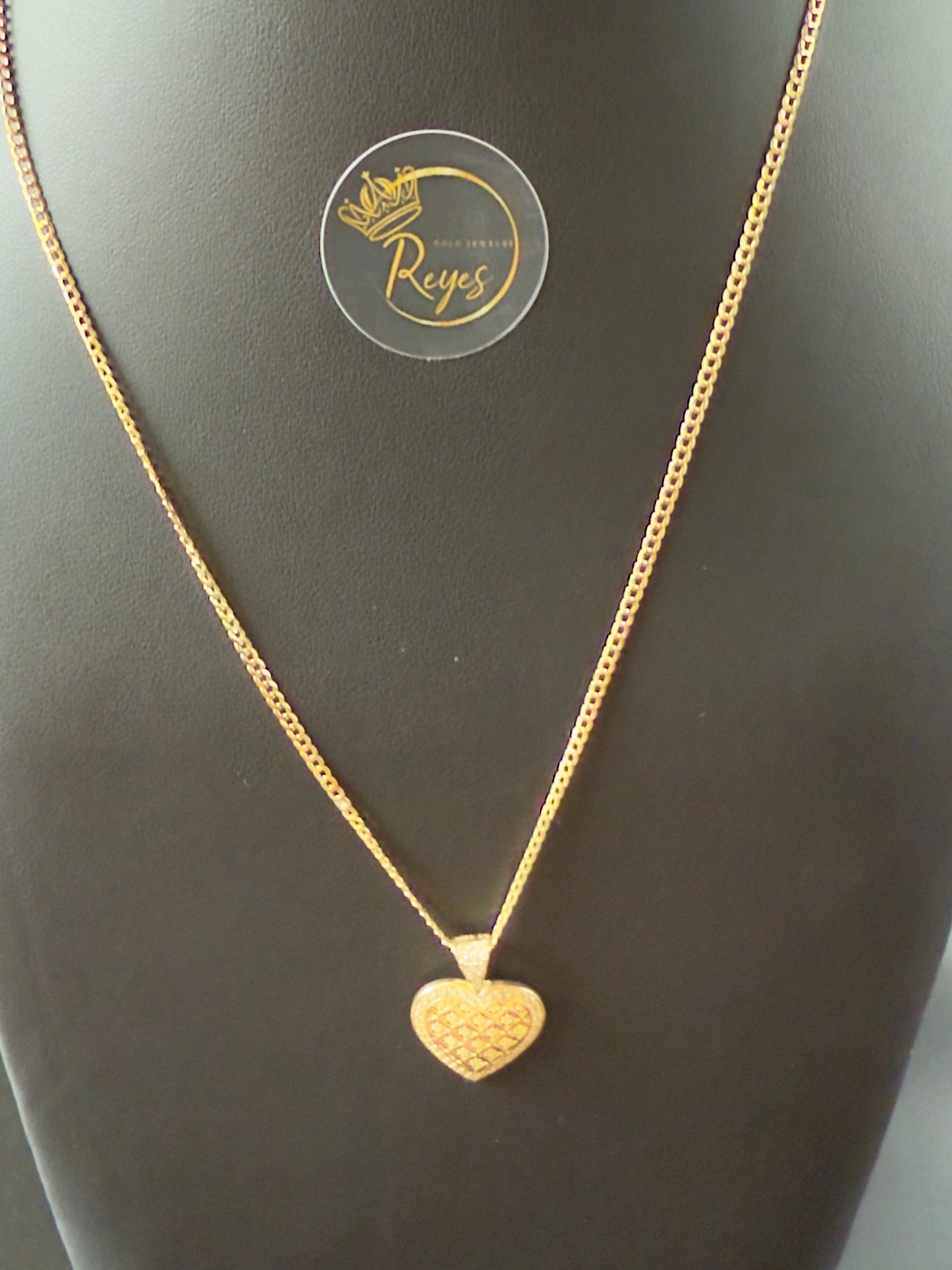 10K Cuban Solid Curb 18" 2mm with heart pendant.