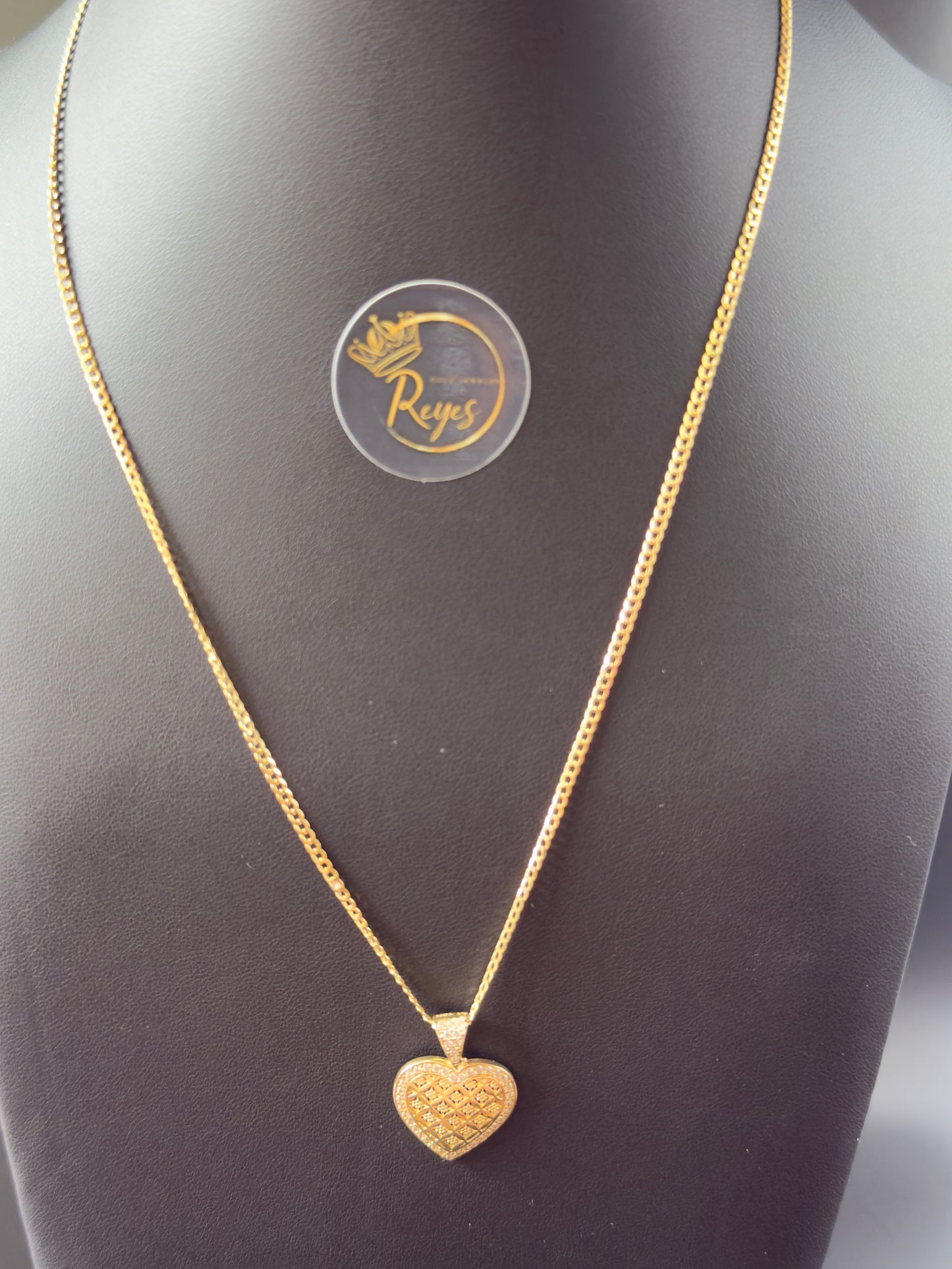 10K Cuban Solid Curb 18" 2mm with heart pendant.