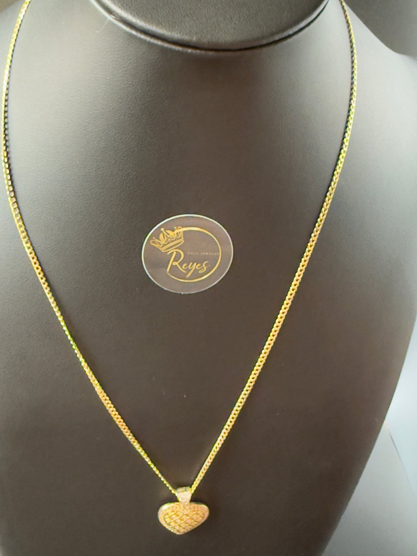 10K Cuban Solid Curb 18" 2mm with heart pendant.